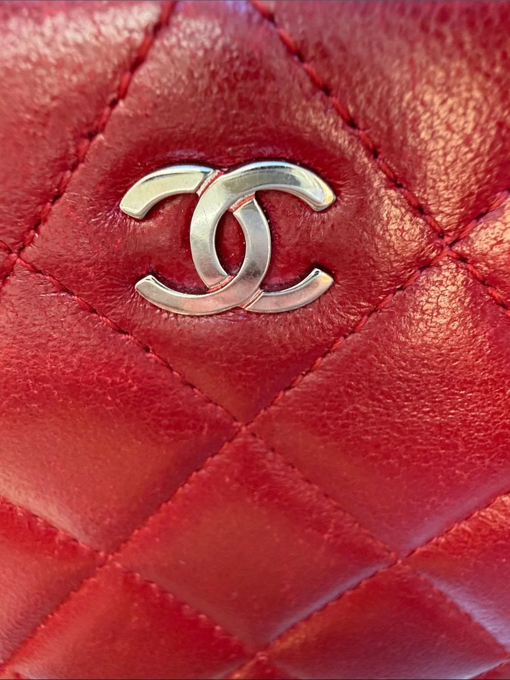 CHANEL Authenticated Quilted Caviar Leather Zip-Around Wallet in Burgundy/red